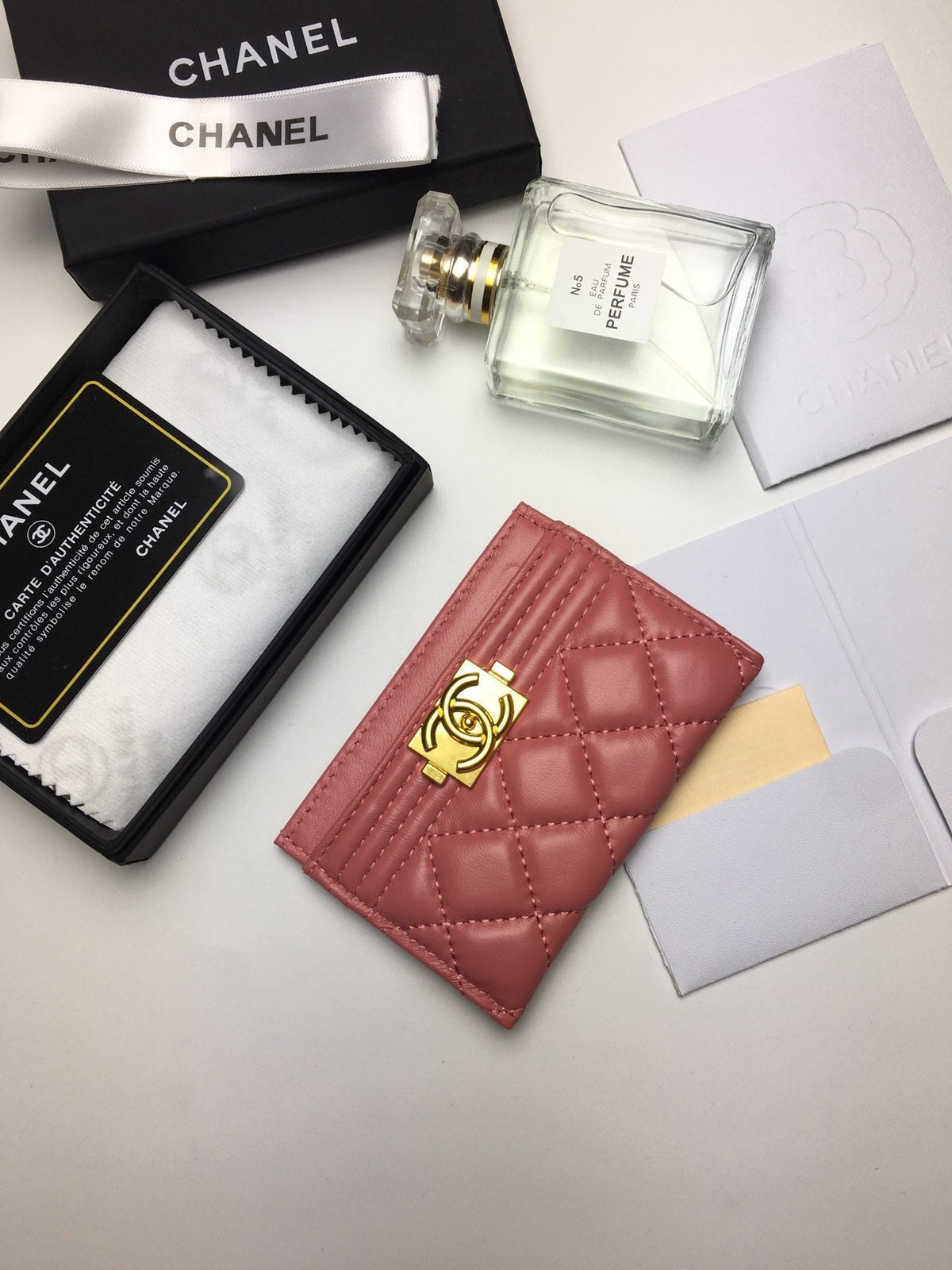 CC BOY CARD HOLDER 11.2 CORAL CALFSKIN GOLD ICON