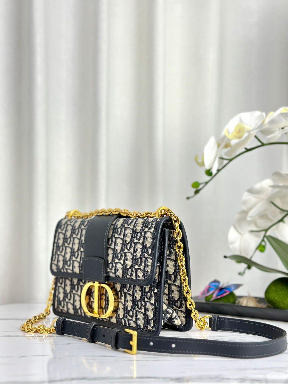 MONTAIGNE 25 BAG IN BLUE OBLIQUE JACQUARD