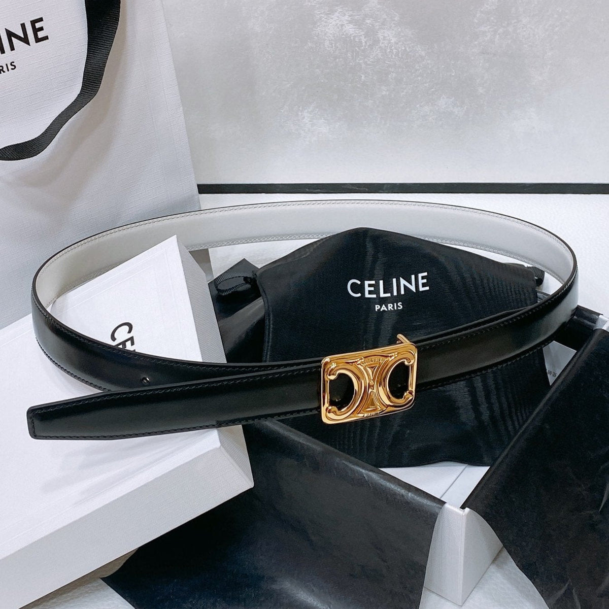 CL MEDIUM 25 MM TRIOMPHE BELT IN TAURILLON AND BLACK CALFSKIN GOLD HARDWARE