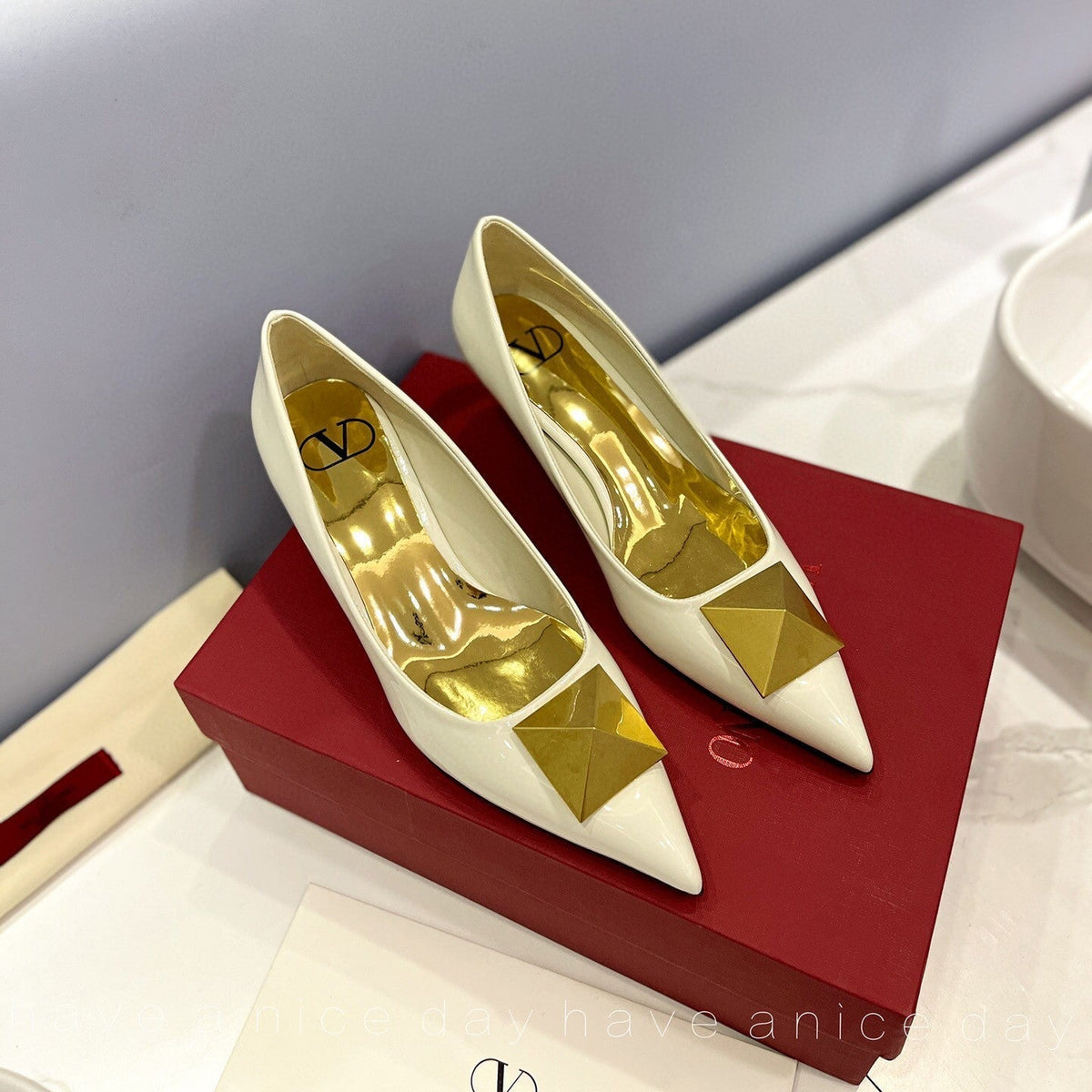 One Stud Gold Patent White Leather Pump