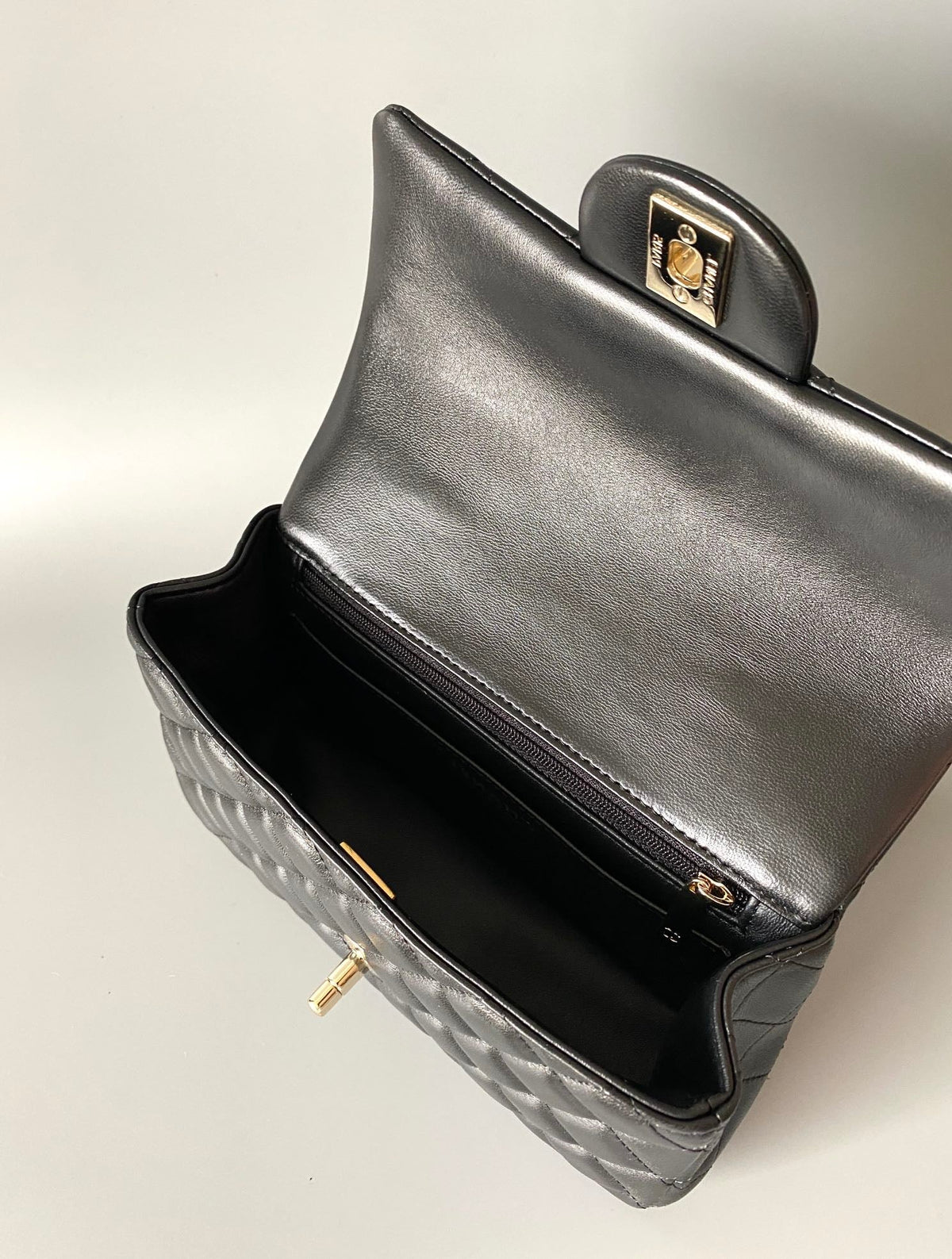 mini flap bag top handle 20cm black lambskin gold hardware