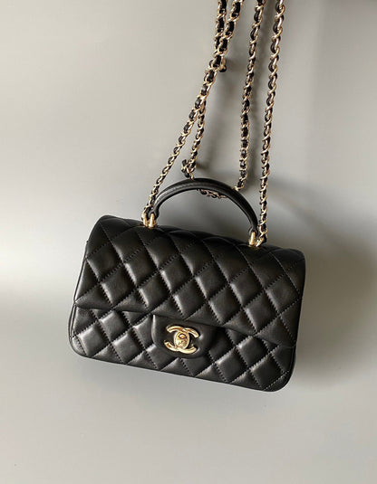 mini flap bag top handle 20cm black lambskin gold hardware