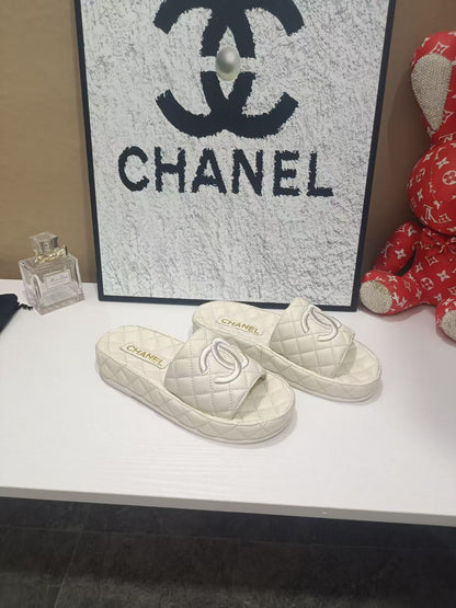 Chanel 26s Quilted Slide Sandals In White Calfskin