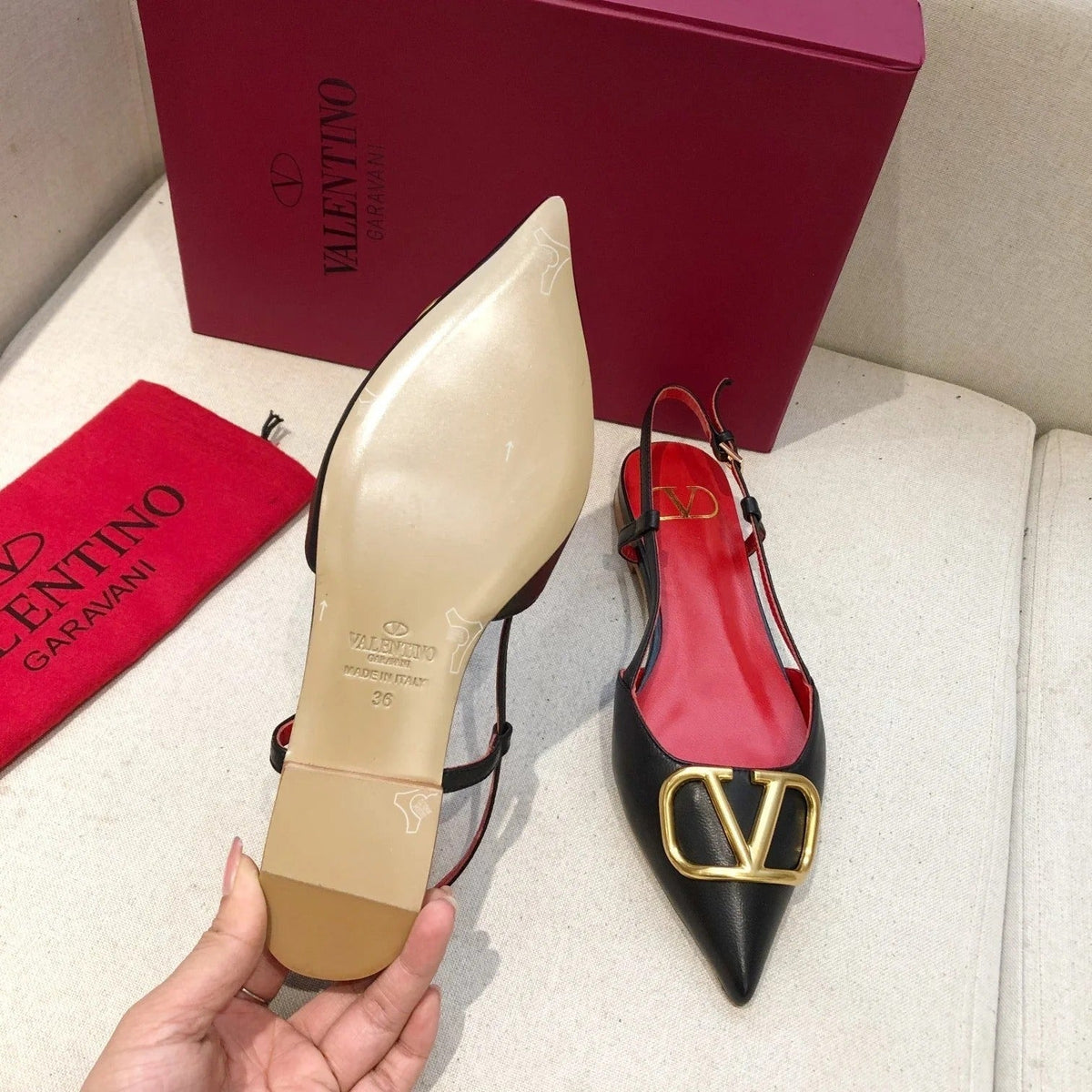 VLOGO SIGNATURE BLACK CALFSKIN FLAT SLINGBACK PUMP WITH GOLD LOGO